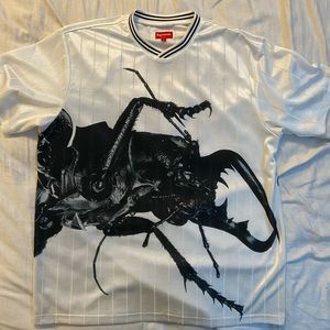 Authentic Supreme beetle soccer tee.